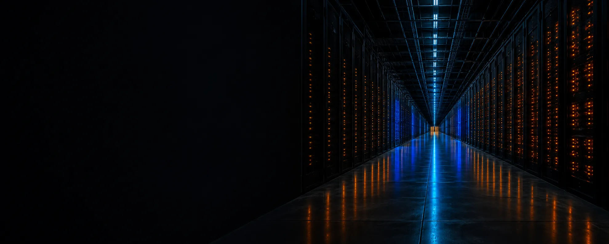 The centre aisle of a vast dark server hall, amber status lights receding to a distant vanishing point.